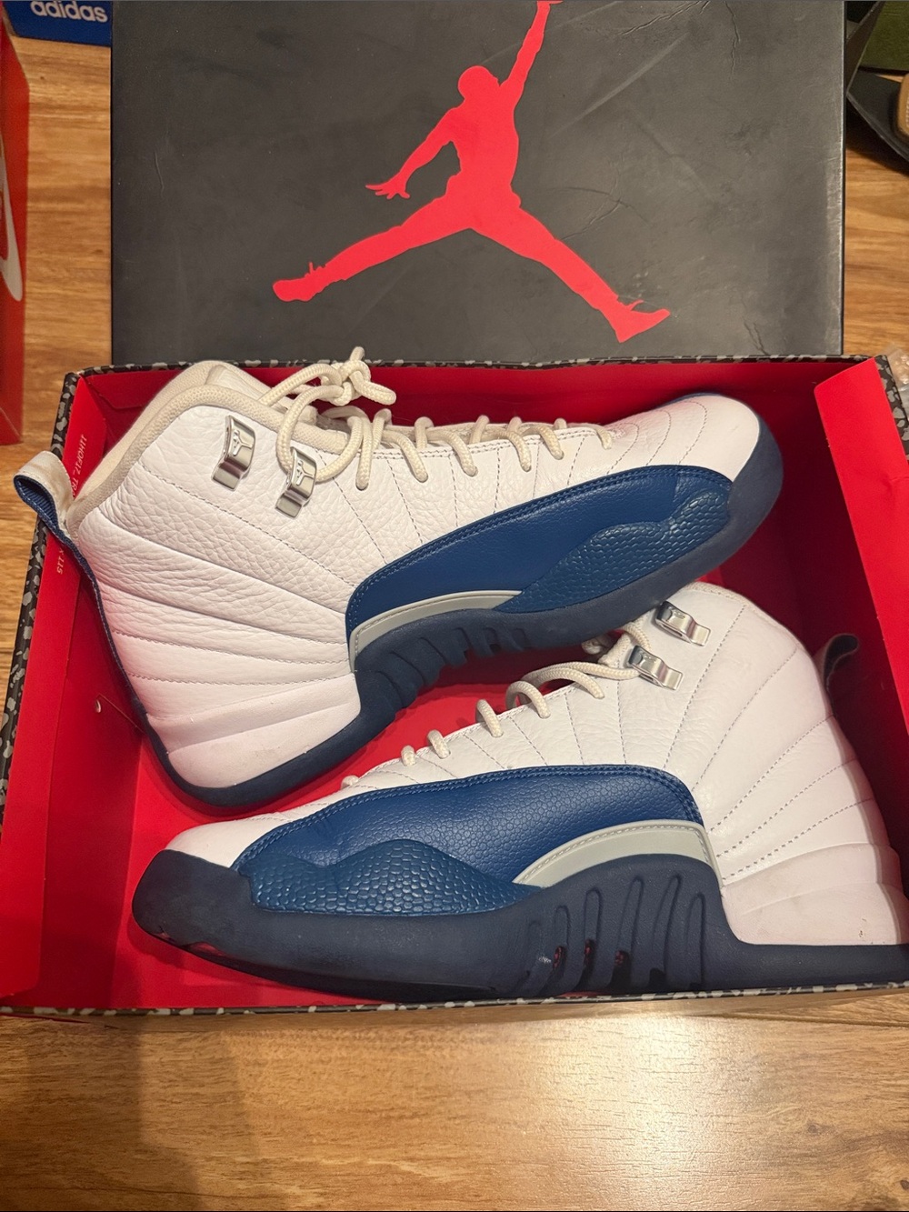 Jordan Retro High-Top Sneakers in White and Blue